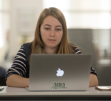 student working on a laptop